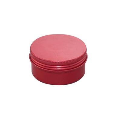 Small empty cosmetic tin container